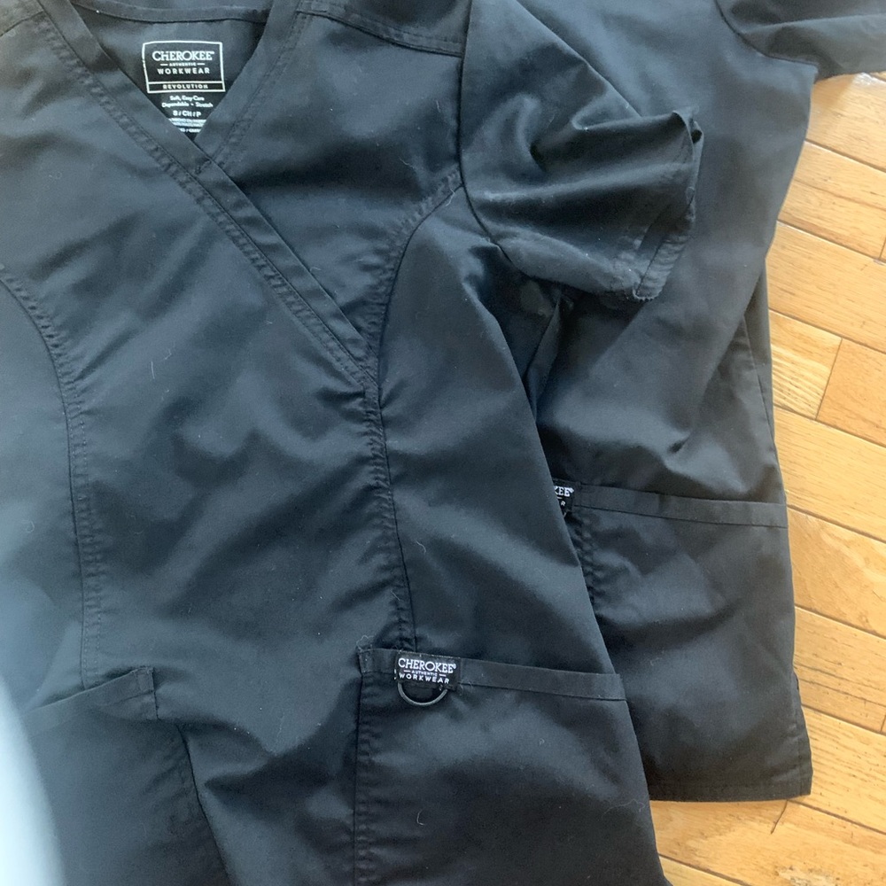 Two scrub tops